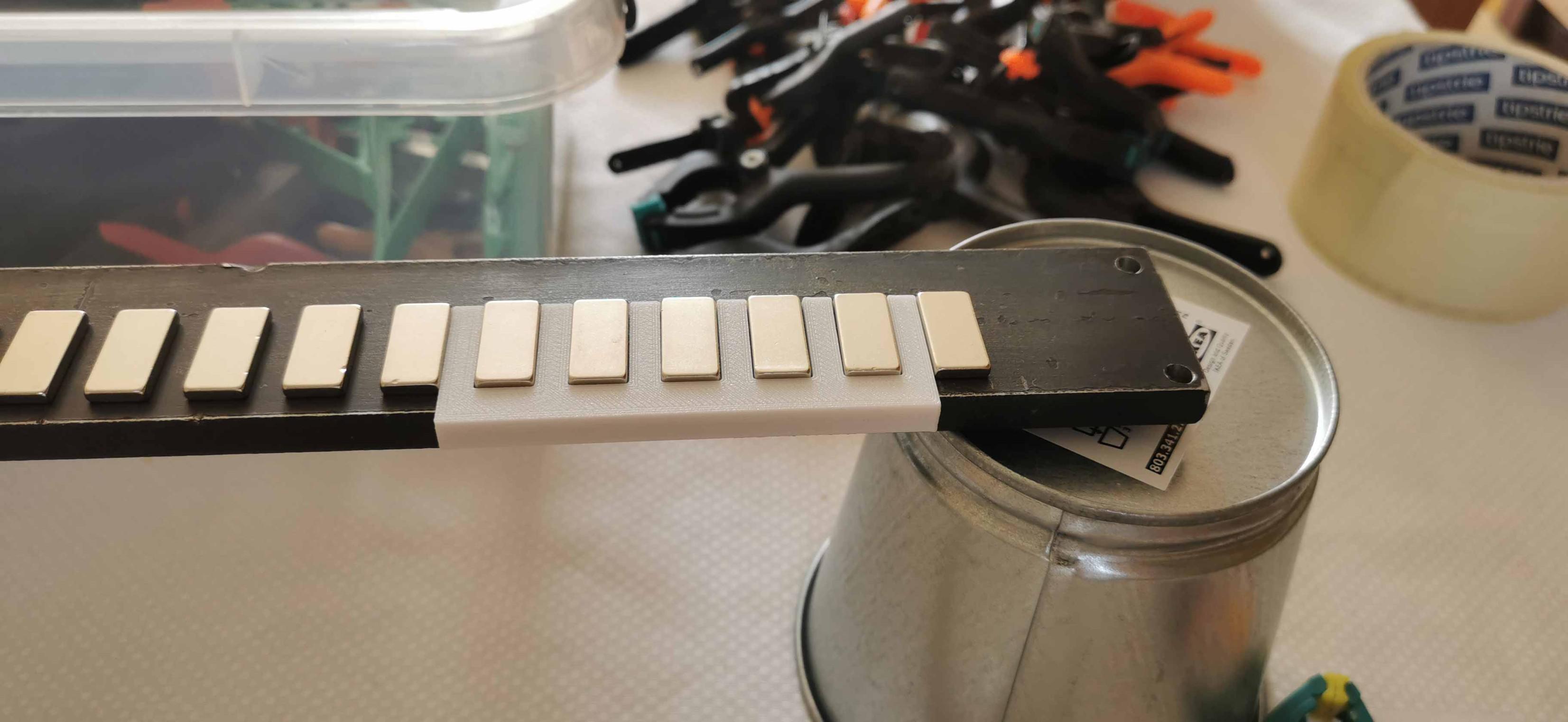 3D-printed spacer used to position magnets during gluing