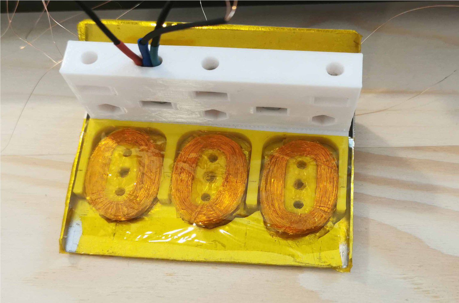 Assembled mover with coils and aluminum plates