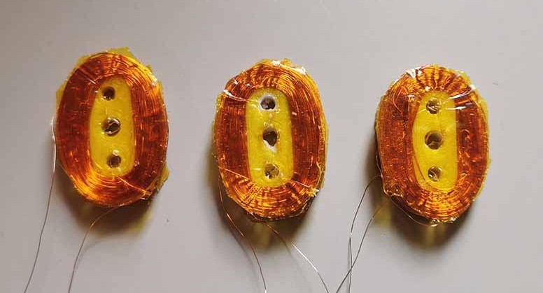 The three copper coils wound and ready to be installed